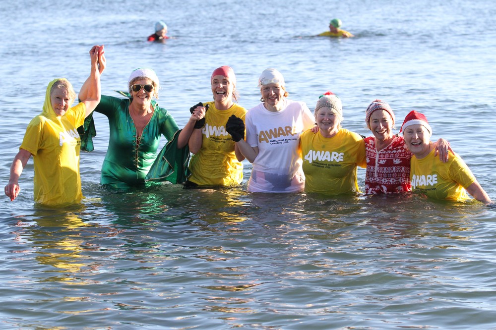 125 swimmers brave the cold for the AWARE New Year Splash event